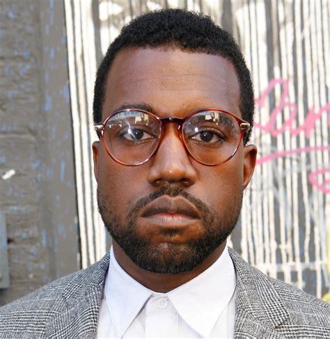 kanye west wearing glasses.